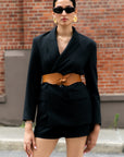 Back view of the Esquel Belt in caramel leather, tied at the front.